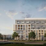 Exterior view of The Wilmot condos at sunset.